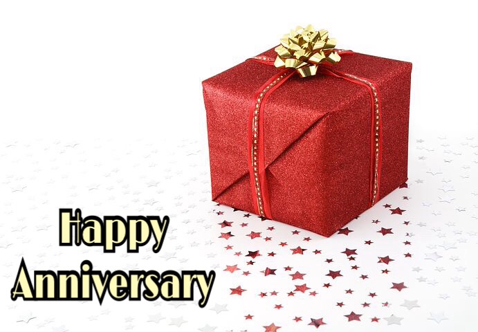 Happy anniversary image with gift