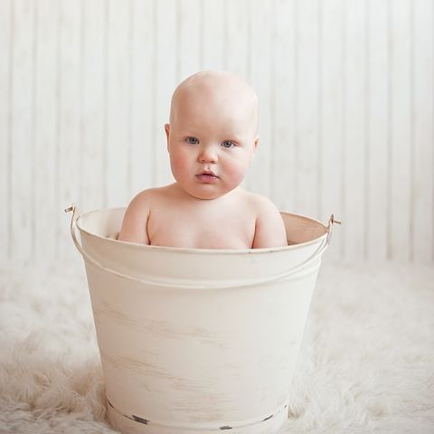 baby in bucket photography